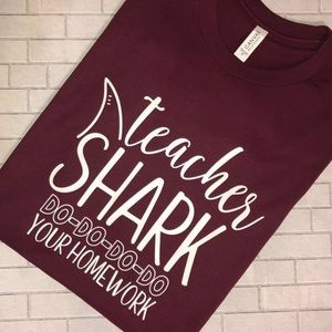 Teacher shark T-shirt in maroon.
